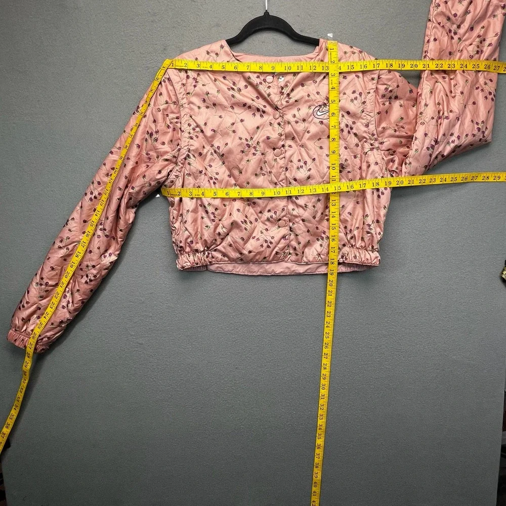 Nike Icon Clash women convertible floral quilted jacket S pink‎ satin crop